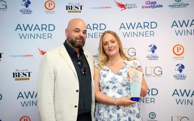 Emma and Kev Workman with the Prestige Awards trophy for Audiology Clinic of the Year
